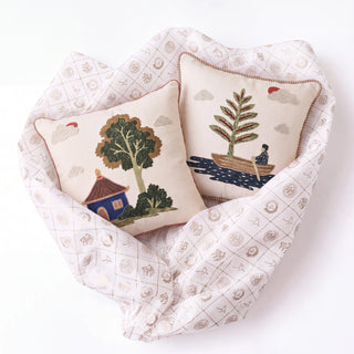 Celestial Village gift set: the Pine and Pagoda cushion covers nestled in Prasanaakshi gift wrap