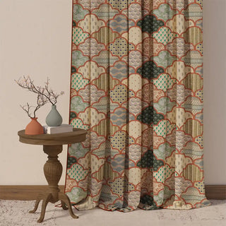 The Chaap Pipin curtain, showcasing its scalloped patchwork design in earthy tones of terracotta, green, and beige.