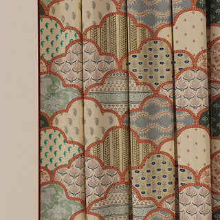 A detailed shot of the Chaap Pipin curtain fabric, showing the various block-print-inspired patterns and colors up close.