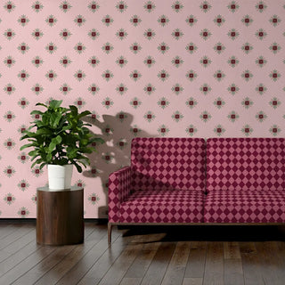 Chausar Sofa and Chair Upholstery Fabric in bold maroon and pink diamond checks, styled on a sofa.