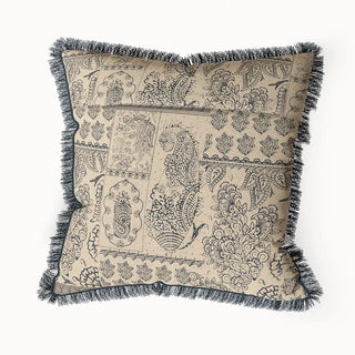A back view of the "Chhaya Fringes" cushion cover, showcasing its full form and the continuity of the stylized block-print pattern.