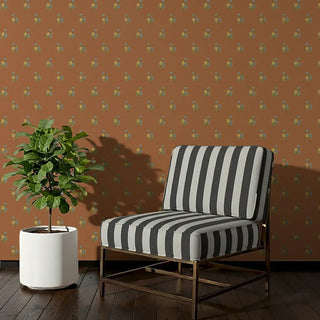 Chitra Sofa and Chair Upholstery Fabric in bold black and white stripes, styled on a lounge chair.