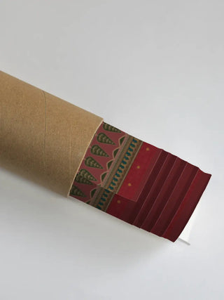 High-quality archival canvas material for the Chitrakar art print shown safely rolled inside a durable protective tube.