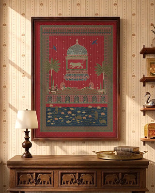 The Chitrakar luxury framed canvas artwork styled above a vintage carved wooden elephant credenza in a traditional entryway.