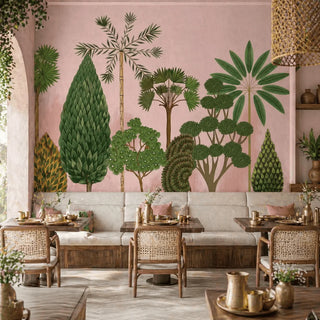 Modern living room with a madhuban pink wallpaper featuring green tree mural, beige sofa, and wooden chairs. view-restaurants