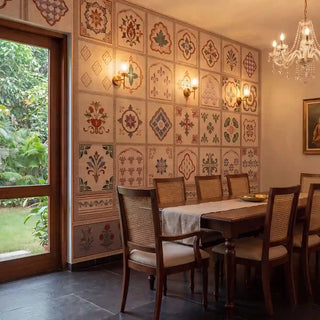 The Chitrangan architectural mural creating a majestic, storied backdrop across a long window-lit formal dining room view-diningroom