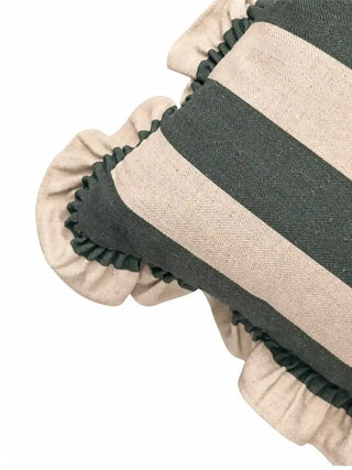 Close-up of the Cinnamon ruffle cushion cover in green, showing the gathered ruffle edge and the herringbone texture of the woven stripes.