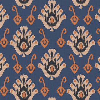 A close-up view highlighting the intricate nomadic motif in beige and terracotta against a blue backdrop.