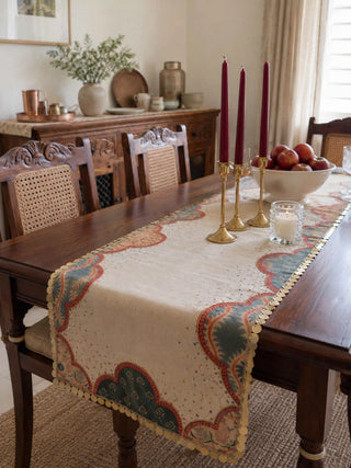 An expansive view of the Riwaayat runner and matching Mehrab arch-shaped placemats setting a sophisticated table for a festive banquet.