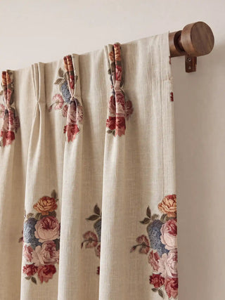 The Cotswold Rose custom curtain header displaying tailored triple pinch pleats hanging from a dark walnut wooden curtain rod.