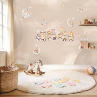 A sophisticated playroom setting featuring the peach Cuddly Express mural behind a white rug and wooden rocking horse.