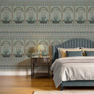 The Dastaan blue mural styled behind a teal velvet headboard and a classic wooden nightstand in a luxury bedroom.