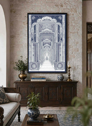Framed Dilli Darbar wall art above a wooden console beside a cream sofa in a warm stone-walled living room