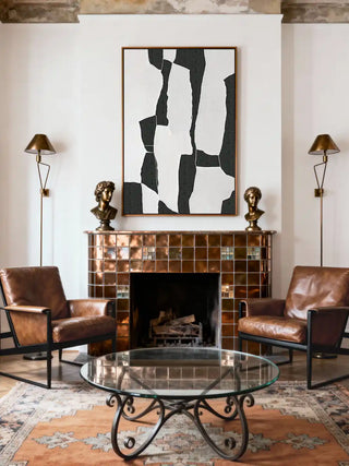 Echoes of Balance abstract wall art styled above a copper-tiled fireplace with mid-century leather chairs.