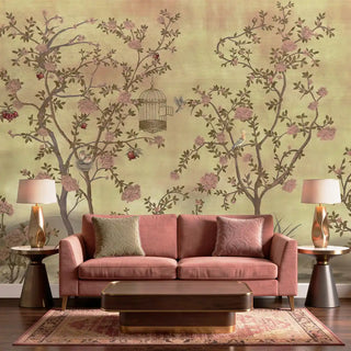 A luxury living room featuring the Enchanted Glade mural behind a dusty rose velvet sofa and modern brass lamps.