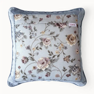 The reverse side of the Eternal Garden blue cushion cover showing the continuous floral pattern and hidden zipper.