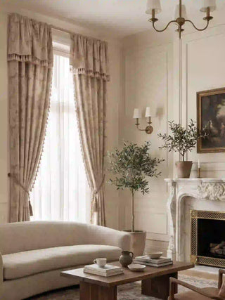 The European Tapestry pre-stitched luxury drapery panel adding an elegant neutral texture to a modern traditional living room layout.