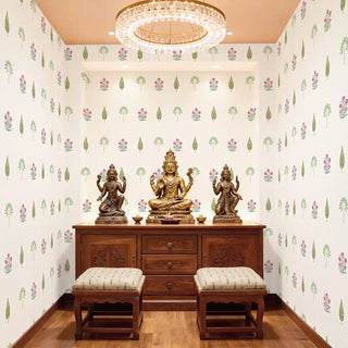 A luxury pooja room featuring Floral Beauty wallpaper with pink blossoms and green cypress buti patterns on a white background view-poojaroom