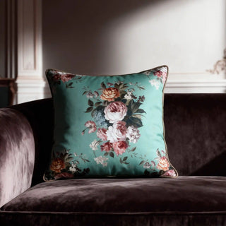 Single Flored Eden Bouquet Cushion Cover displayed on a dark velvet sofa in a lavish setting.