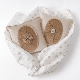 Close-up of the hand-gathered velvet pleating and rosette detail on the Florence Pleated and Frieze cushions.