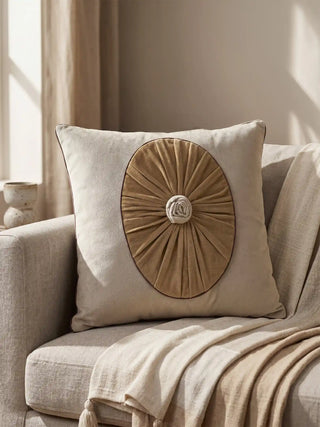 A direct front-facing view of the Florence cushion cover highlighting the central sunburst pleats and hand-finished rosette.