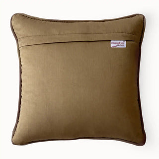 Back view of the cushion cover showing the solid tawny velvet backing and concealed zipper.