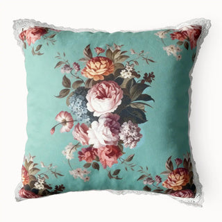 Full studio view of the Florid Rosette Cushion Cover with aqua floral print and white lace.