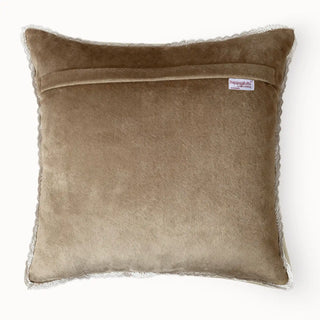 Detailed close-up of the floral print on the aqua cushion, highlighting the sequin embellishments.