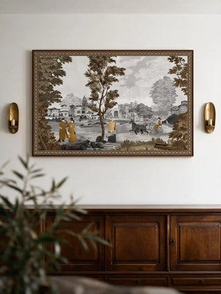 The French Life wall art, landscape orientation, framed above a dark wood sideboard with brass wall sconces.