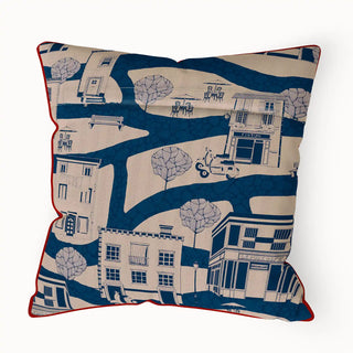 A back view of the "French Town Pipin" cushion cover, showing its full form and the continuity of the whimsical town illustration.