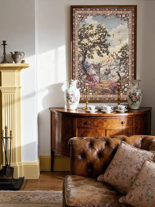 Garden of Tunes wall art styled above a vintage wooden sideboard and leather sofa in a luxury living room