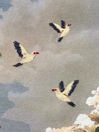 Close up of the Garden of Tunes design showing the detailed texture of flying birds against a soft sky