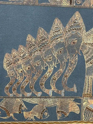 Macro view of a line of regal elephants in the Geet Madhubani design, highlighting the fine decorative embroidery