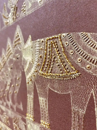 A detailed close-up of the Geet Madhubani embroidered wall art highlighting an elephant’s beaded and sequinned trappings and fine gold thread work
