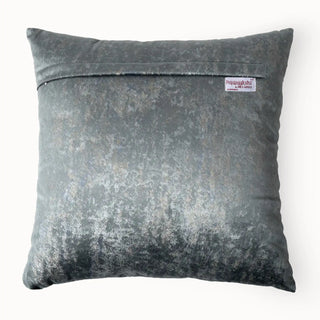 Back view of the Gilded Echo Cushion Cover showing the solid grey crushed velvet and zipper.