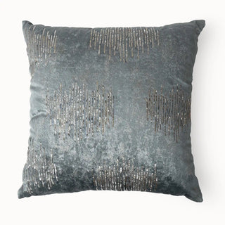 Full studio view of the Gilded Echo Cushion Cover with shimmering silver lines on grey velvet.