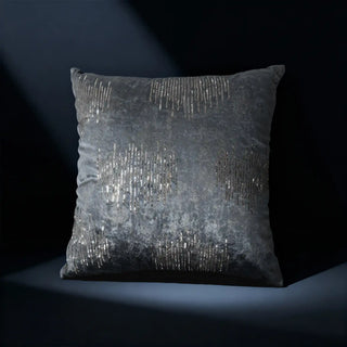 Single Gilded Echo Cushion Cover displayed on a dark surface, highlighting the sequin shimmer.