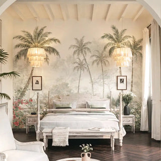 The vintage tropical palm mural providing an expansive heritage headboard backdrop for a carved white four-poster bed view-bedroom
