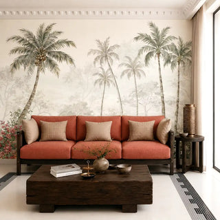 The panoramic tropical palm tree wallpaper styled elegantly behind a contemporary terracotta-orange sofa and dark wood coffee table view-livingroom