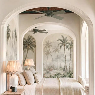 The Goa Coastal Romance tropical palm wallpaper customized inside elegant white stone archways in a luxury bedroom layout.
