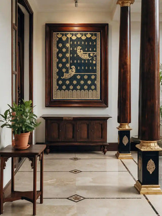 Golden Crest wall art framed in a dark walnut frame and hung in a classical Indian foyer with dark wooden columns with gold capitals, marble inlay flooring, a carved wooden sideboard, and a terracotta potted plant
