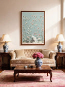 Luxury living room setting featuring the wall art above a beige tufted sofa with blue-and-white porcelain accents