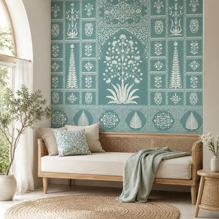 Gul Indian art wallpaper styled behind a cane-back daybed with neutral pillows and a jute rug. view-living room