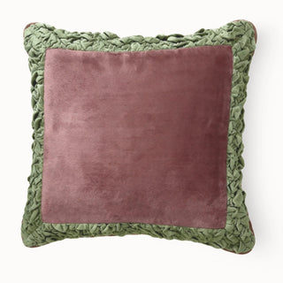 Full studio shot of the Gulaal Cushion with pink velvet center and green border