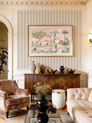Gulbiya Chinoiserie wall art framed against a neutral striped wallpaper background above a dark wood sideboard in a luxury living room.