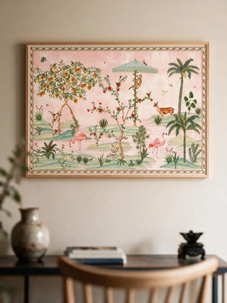 The Gulbiya Chinoiserie wall art in Blush Pink, framed and hung view-entryway above a dark console table with a brass vase.