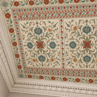 Angled view of the Gulistan Medallion ceiling wallpaper showing symmetrical ceiling panels, rope-twist borders, and intricate crown molding details