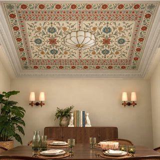 Gulistan Medallion ceiling wallpaper on a dining room ceiling above a dark wooden dining table and credenza with a scalloped glass ceiling light.