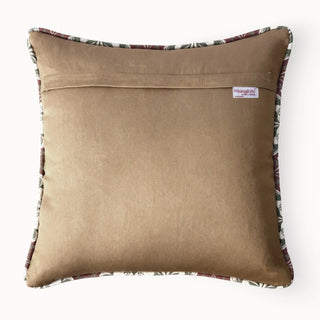 Back view of the Gulmohar Noor Buta Cushion showing the tan velvet backing and patterned piping.