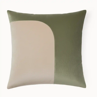 Half n Half Cushion Cover: Front view of the olive green and cream decorative pillow with an abstract, curving color block design.
